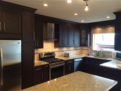 Maspeth Kitchen Ebony cabinet with gaillio ornamental